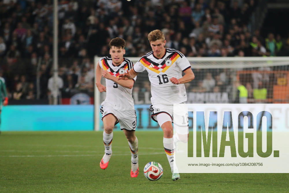 Men s Soccer 2026–2027 UEFA U-21 European Championship Qualifiers Matchday 12 Germany vs. Georgia SchücoArena, Bielefeld Aljoscha Kemlein (Germany), 16, in white with the ball; Lukas Ullrich (Germany), 3, in white, follows him Bielefeld, North Rhine-Westphalia, Germany