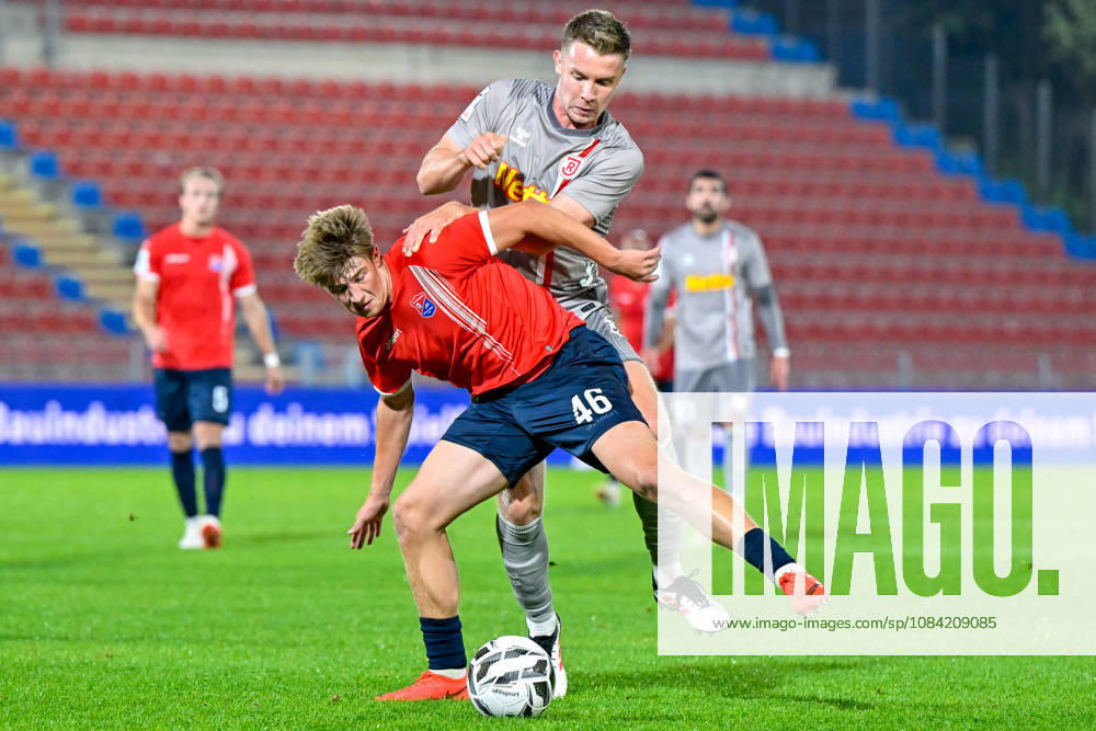 From left: Marinus Spann (Unterhaching), 46; Erik Majetschak (Regensburg), 13; in a one-on-one battle, duel, tackle, dynamic play, action, October 6, 2026, Unterhaching, Germany, soccer, BFV Association Cup, quarterfinals, SpVgg Unterhaching vs. SSV Jahn Regensburg