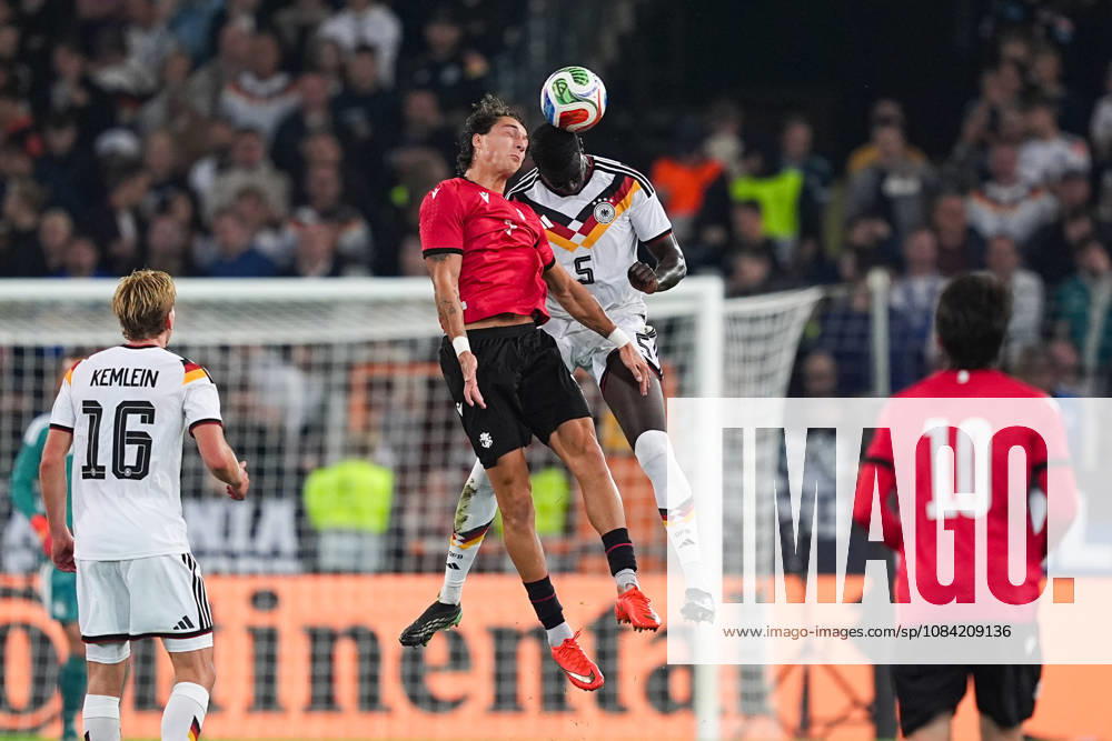 Men s, Soccer, International Match, U21, European Championship Qualifiers, Germany vs. Georgia, 2026–2027 Season, Schüco Arena Diego Deisadze GEO, No. 9 in a tackle against Joshua Quarshie GER, No. 5 DFB regulations prohibit any use of photographs as image sequences and or quasi-video