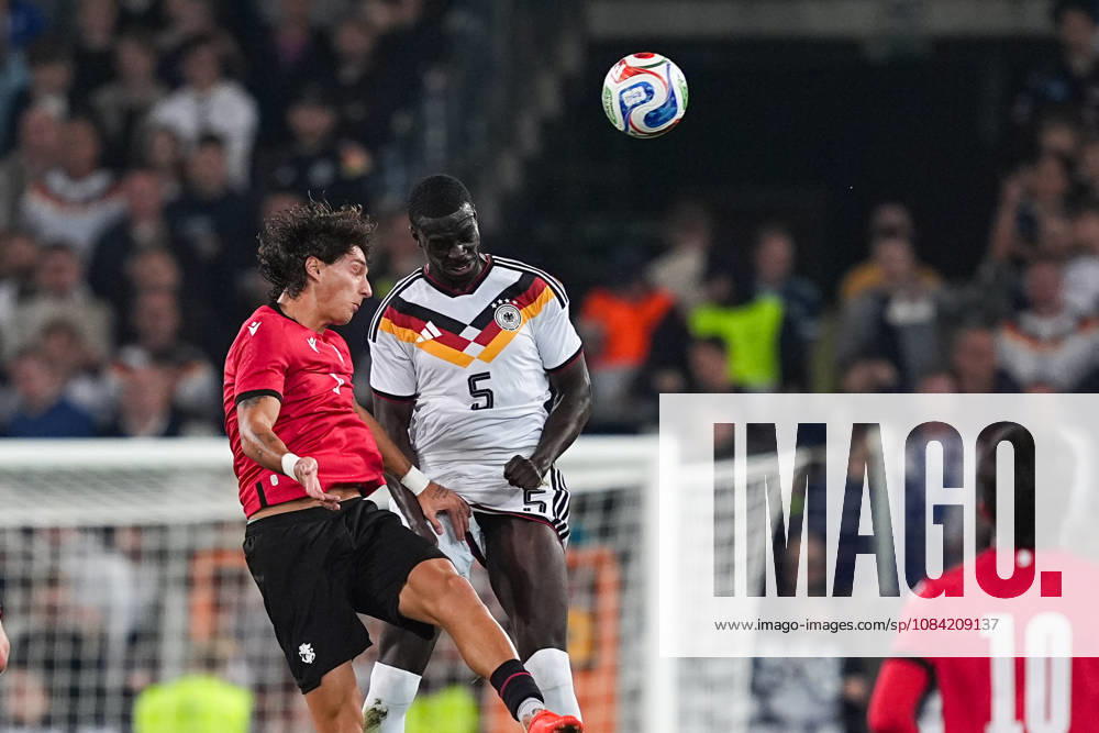 Men s, Soccer, International Match, U21, European Championship Qualifiers, Germany vs. Georgia, 2026–2027 Season, Schüco Arena Diego Deisadze GEO, No. 9 in a tackle against Joshua Quarshie GER, No. 5 DFB regulations prohibit any use of photographs as image sequences and or quasi-video