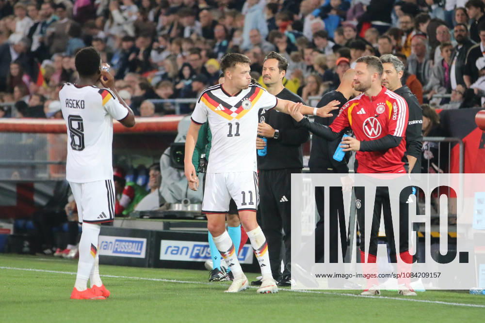 Men s Soccer 2026–2027 UEFA U-21 European Championship Qualifiers Matchday 12 Germany vs. Georgia SchücoArena, Bielefeld Dzenan Pejcinovic (Germany, No. 11, white) and Shkodran Mustafi (Germany, assistant coach after the 2–0 win in Bielefeld, North Rhine-Westphalia, Germany