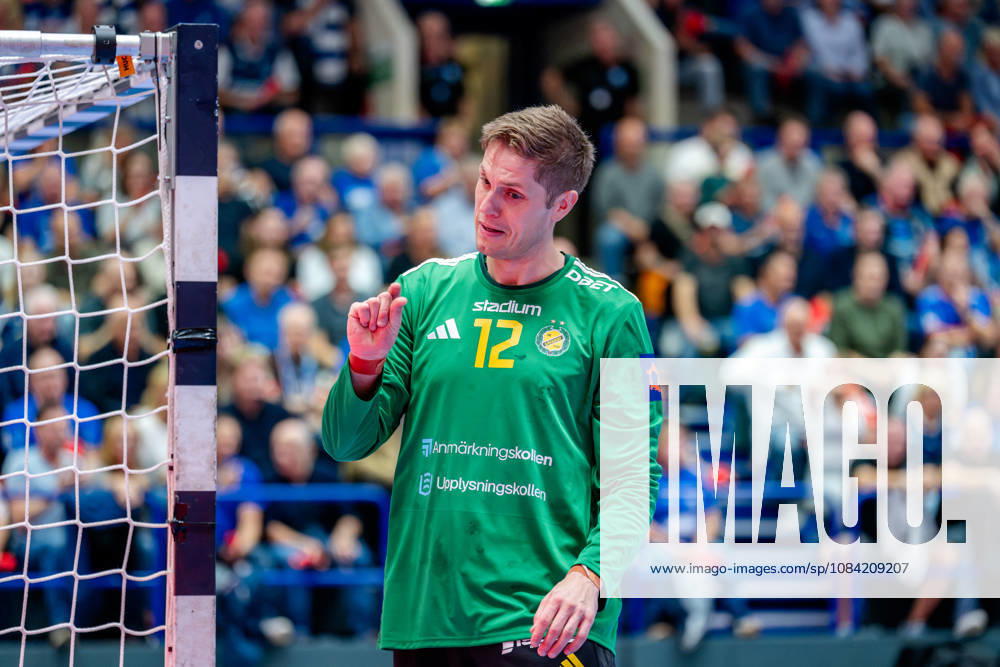 Solingen, October 6, 2026, Handball, Men s, EHF, European League, Group Stage, Matchday 2, 2026–2027, Bergischer HC vs. IK Sävehof, Peter Johannesson (IK Sävehof), No. 12, gesturing toward Julian Fuchs (Bergischer HC), No. 46, who is lying on the floor