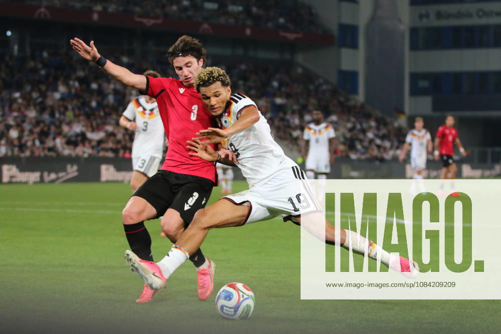Men s Soccer 2026–2027 UEFA U-21 European Championship Qualifiers Matchday 12 Germany vs. Georgia SchücoArena, Bielefeld Paris Brunner, Germany, 19, in a tackle with Dato Bukia, Georgia, 3, red Bielefeld, North Rhine-Westphalia, Germany