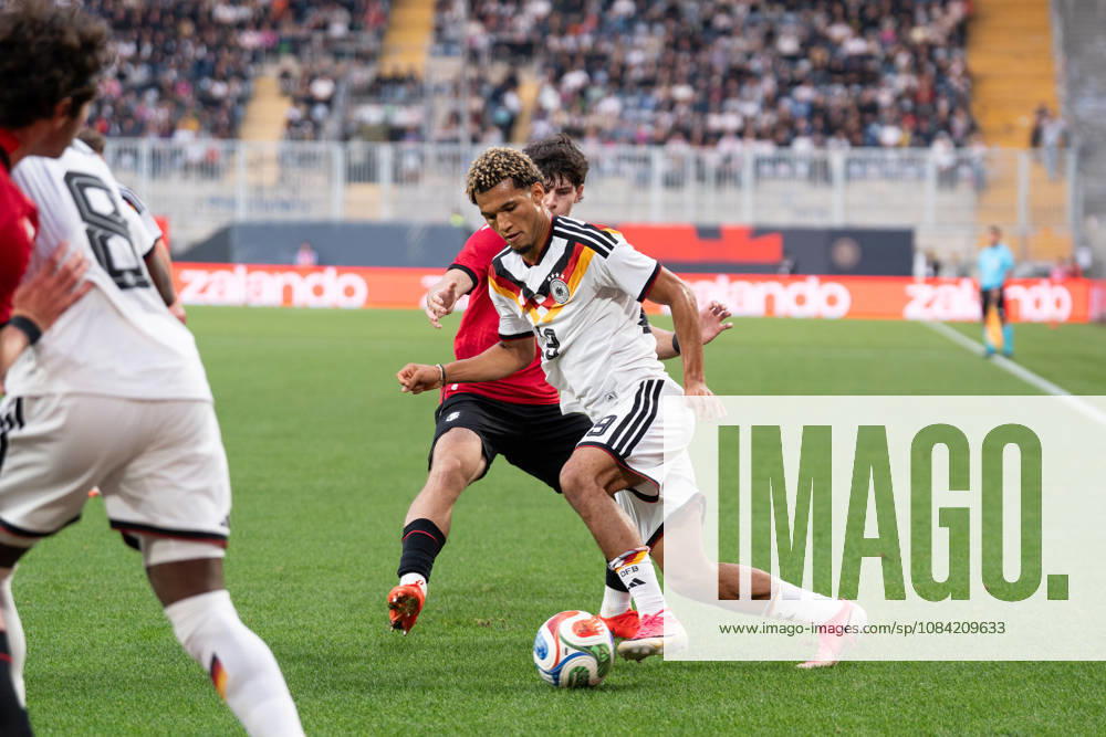GER, Germany U21 vs. Georgia U21: A duel between Paris Brunner (Germany U21, 19) and Vakhtang Salia (Georgia U21, 7) at the SchücoArena in Bielefeld, Germany