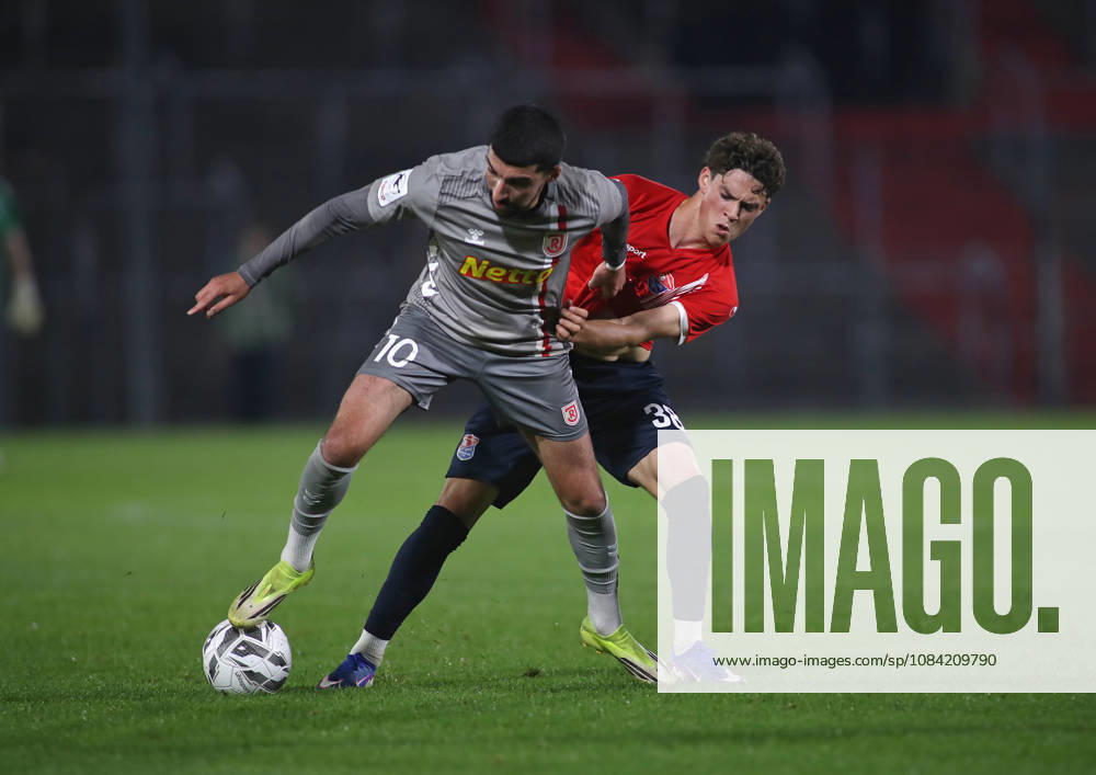 Soccer, Men s, Toto Cup, Quarterfinals, 2026–2027 Season, SpVgg Unterhaching vs. SSV Jahn Regensburg, Sportpark Unterhaching: Nassim Boujellab (SSV Jahn Regensburg, left) and Constantin Strunz (SpVgg Unterhaching, right) battle for the ball