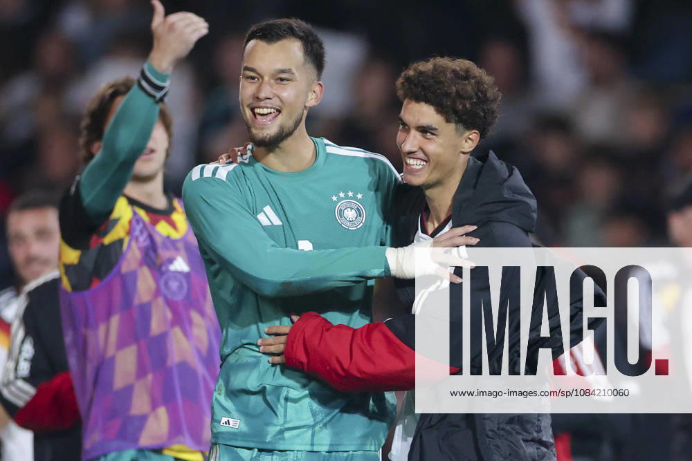 Goalkeepers Mio Backhaus (Germany) and Noah Darvich (Germany) cheer during the UEFA Under-21 EURO qualifier between Germany U21 and Georgia U21 at Almstadion on October 6, 2026, in Bielefeld, Germany. Photo by Marco Steinbrenner, DeFodi Images