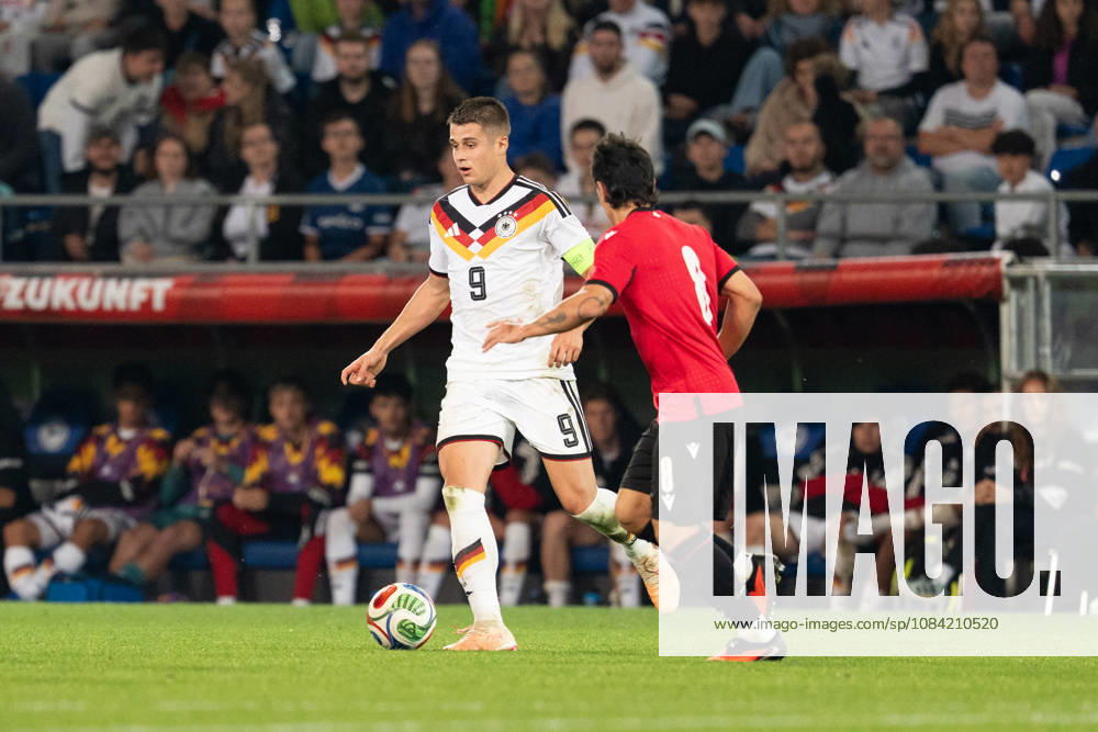 GER, Germany U21 vs. Georgia U21 Nicolo Tresoldi Germany U21, 9 Individual play Full body Full body Ball at his feet Bielefeld SchücoArena Bielefeld Germany