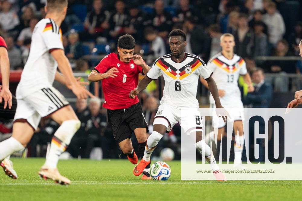 GER, Germany U21 vs. Georgia U21: A duel between Noel Aseko (Germany U21, No. 8) and Giorgi Robakidze (Georgia U21, No. 8) at the SchücoArena in Bielefeld, Germany