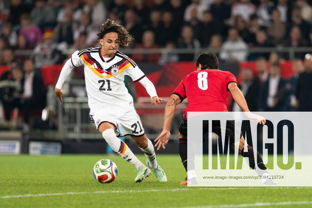 GER, Germany U21 vs. Georgia U21; Tackle between Wael Mohya (Germany U21) and Giorgi Robakidze (Georgia U21); 8; Bielefeld SchücoArena, Bielefeld, Germany