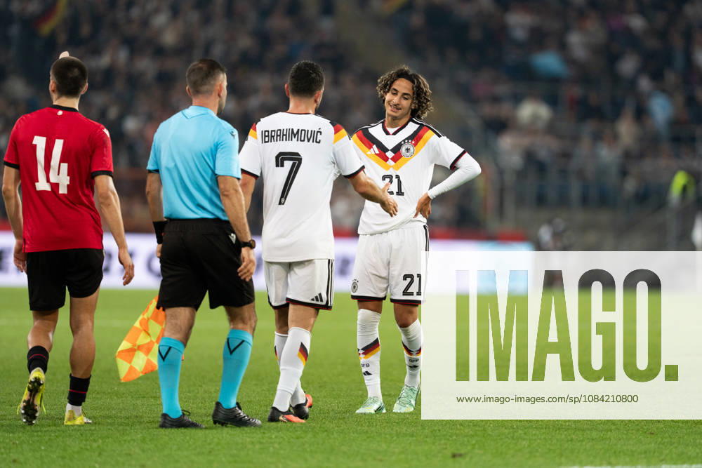 GER, Germany U21 vs. Georgia U21: Arijon Ibrahimovic (Germany U21, 7) and Wael Mohya (Germany U21, 21) shake hands at the SchücoArena in Bielefeld, Germany