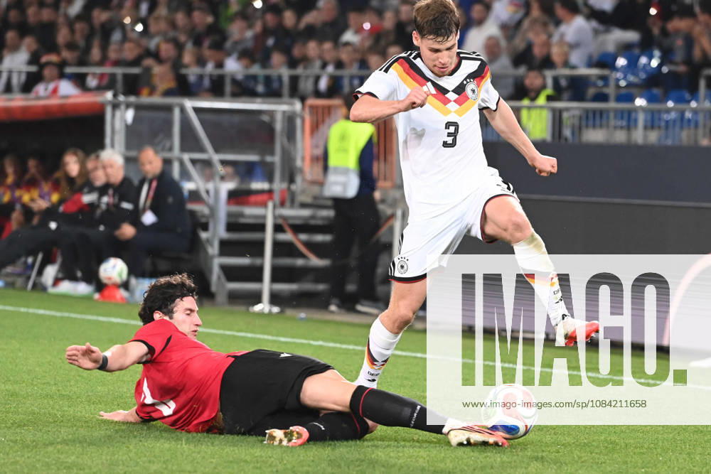 Lukas ULLRICH (GER) vs. Dato BUKIA (GEO) – Action, Tackle, International Soccer Match, U21, European Championship Qualifiers, Germany vs. Georgia 2–0 on October 6, 2026, Schueco Arena, Bielefeld, Â