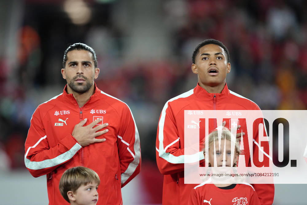 Ricardo Rodriguez Araya (13 SUI) and Sascha Britschgi (2 SUI) during National anthem before the UEFA Nations League match between Switzerland and North Macedonia at thermoplan arena on October 06, 2026 in Luzern, Switzerland.