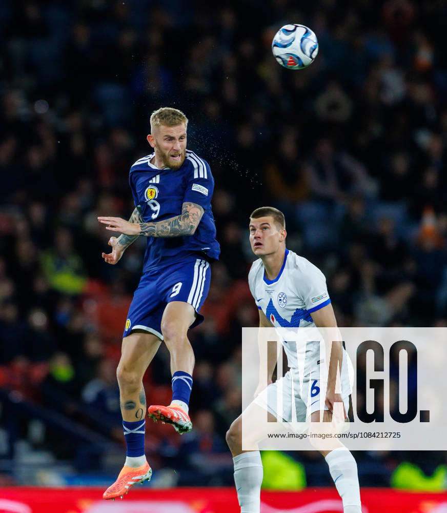 Scotland v Slovenia, UEFA Nations League, League B Group 1 : Oli McBurnie wins a header against Jaka Bijol