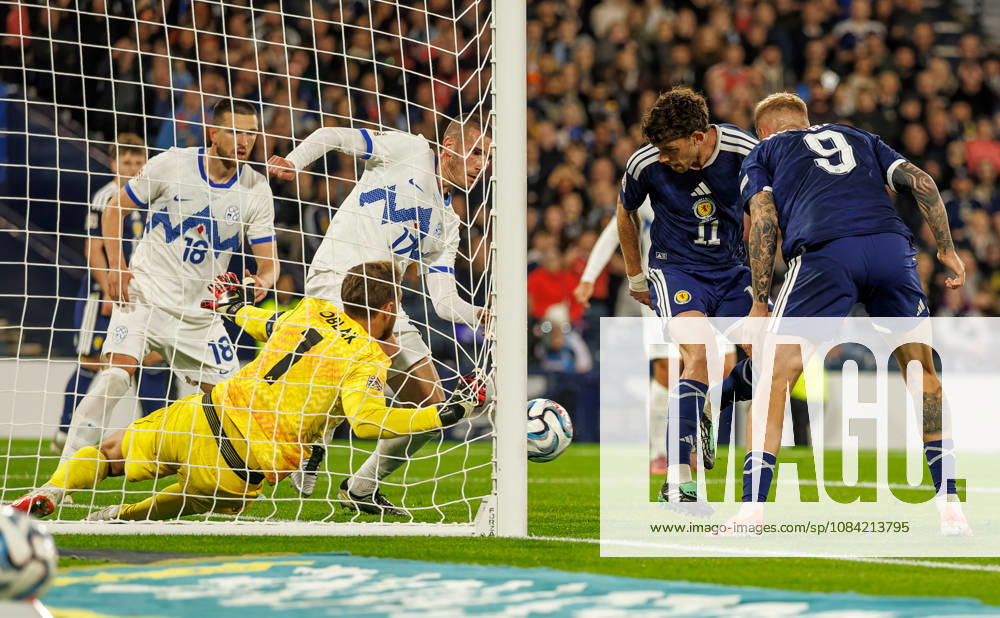 Scotland v Slovenia: Ryan Christie of Scotland scores with a backheel
