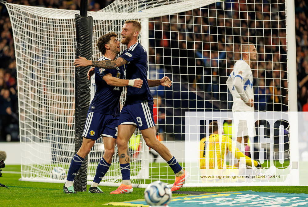Scotland v Slovenia: Ryan Christie celeberates with Oliver McBurnie of Scotland