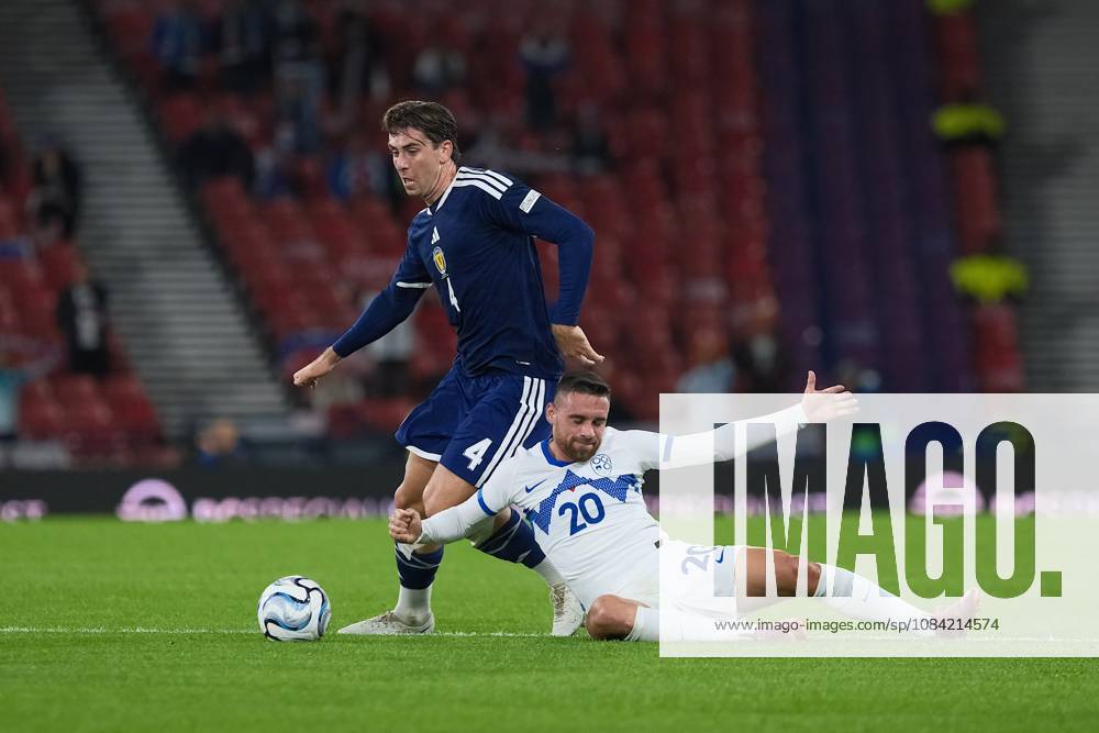 UK: Scotland v Slovenia, UEFA Nations League at Barclays Hampden, Glasgow, Scotland on 06 October 2026: Pictured: Luis Binks (Scotland) and Aljosa Matko (Slovenia) Glasgow Barclays Hampden Scotland