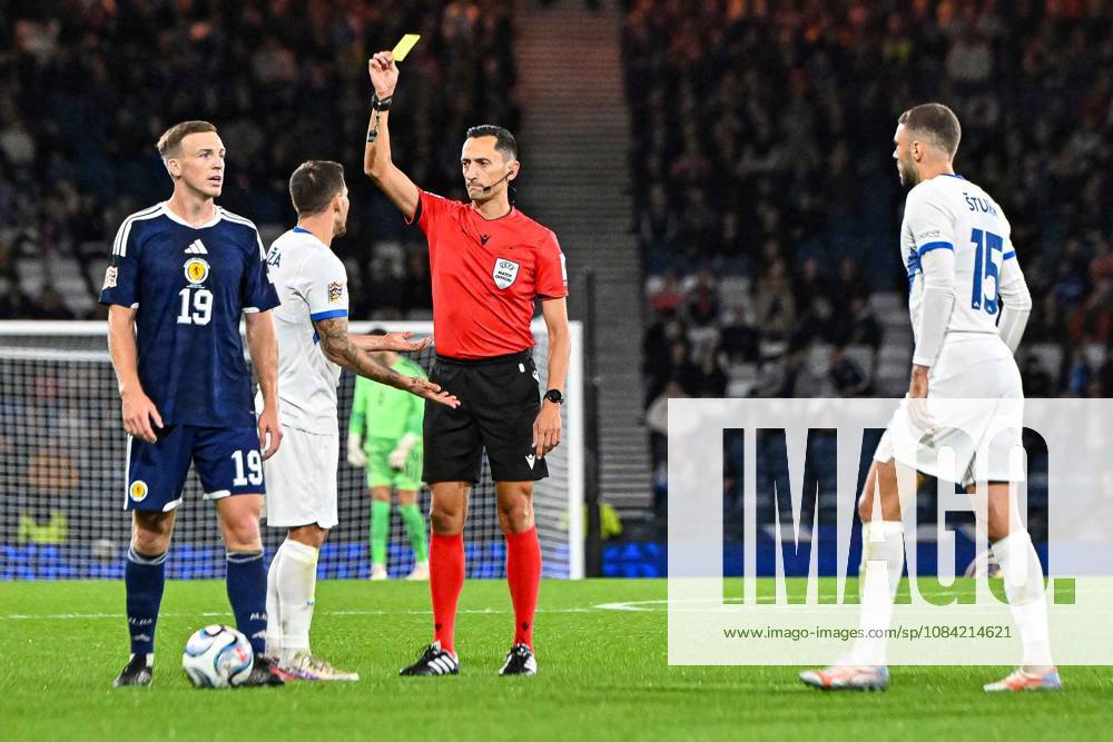 Scotland v Slovenia UEFA Nations League Erik Janza of Slovenia is shown a yellow card by the match referee JosÃ Maria Sanchez Santos during the UEFA Nations League match at Barclays Hampden, Glasgow 06 10 2026 UK Newspapers OUT