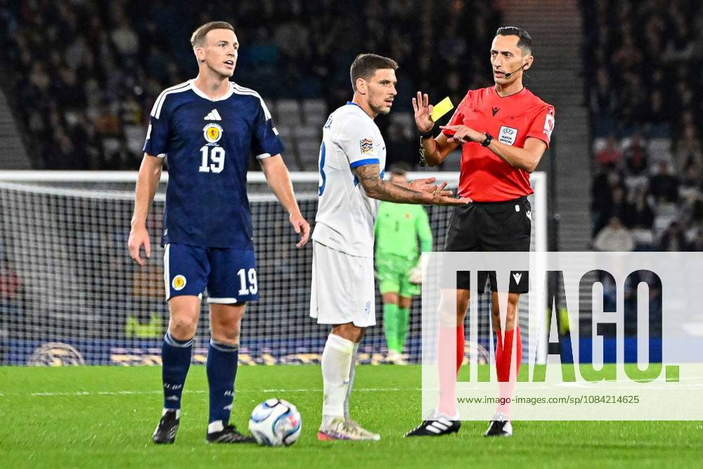 Scotland v Slovenia UEFA Nations League Erik Janza of Slovenia is shown a yellow card by the match referee JosÃ Maria Sanchez Santos during the UEFA Nations League match at Barclays Hampden, Glasgow 06 10 2026 UK Newspapers OUT