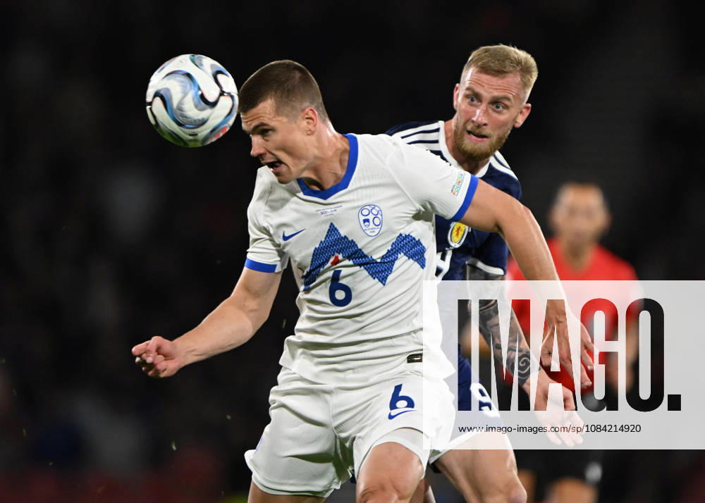 Glasgow, Scotland, 6th October 2026. Oli McBurnie of Scotland and Jaka Bijol of Slovenia during the Scotland vs Slovenia UEFA Nations League match at Hampden Park, Glasgow. Picture credit should read: Neil Hanna Sportimage . SPI_028_NH_Scotland_Slovenia SPI-5054-0027
