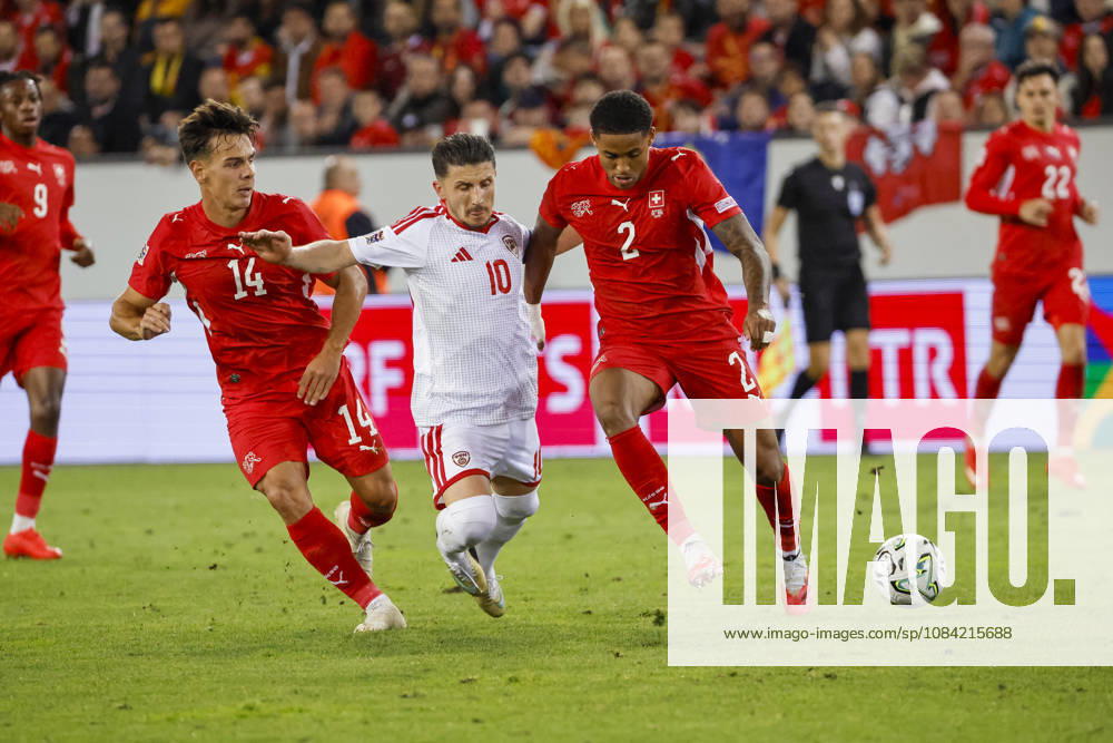Ardon Jashari (Switzerland), 14, Enis Bardhi (North Macedonia), 10, and Sascha Britschgi (Switzerland), 2, battling for the ball; Switzerland, UEFA, Nations League, Matchday 4, Switzerland vs. North Macedonia, October 6, 2026, Lucerne, Swissporarena, Switzerland
