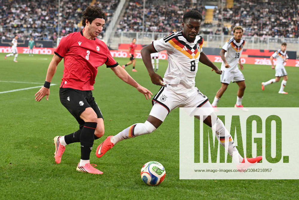 Noel ASEKO (GER) vs. Dato BUKIA (GEO) – Action, Tackle, International Soccer Match, U21, European Championship Qualifier, Germany vs. Georgia 2–0 on October 6, 2026, Schüco Arena, Bielefeld, Â