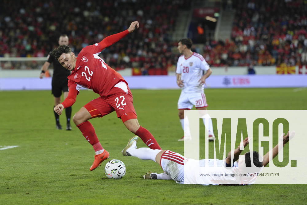 Fabian Rieder (22 SUI) in duel for the ball with Enis Bardhi (10 MKD) during the UEFA Nations League match between Switzerland and North Macedonia at thermoplan arena on October 06, 2026 in Luzern, Switzerland.