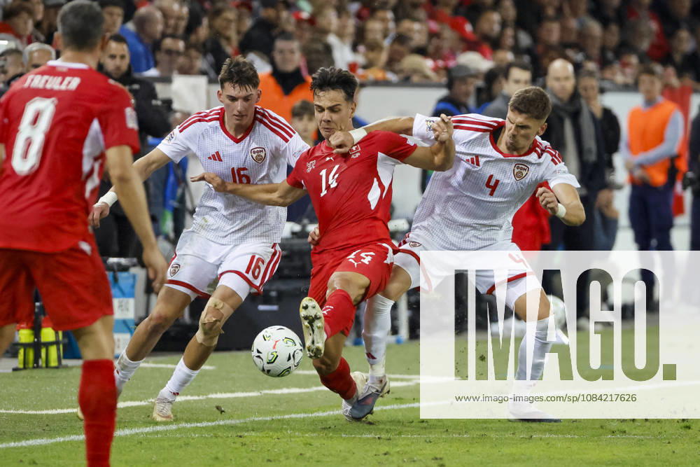 Matej Gashtarov (North Macedonia), 16, Ardon Jashari (Switzerland), 14, and Andrej Stojcevski (North Macedonia), 04, battling for the ball; Switzerland, UEFA, Nations League, Matchday 4, Switzerland vs. North Macedonia, October 6, 2026, Lucerne Swissporarena, Switzerland
