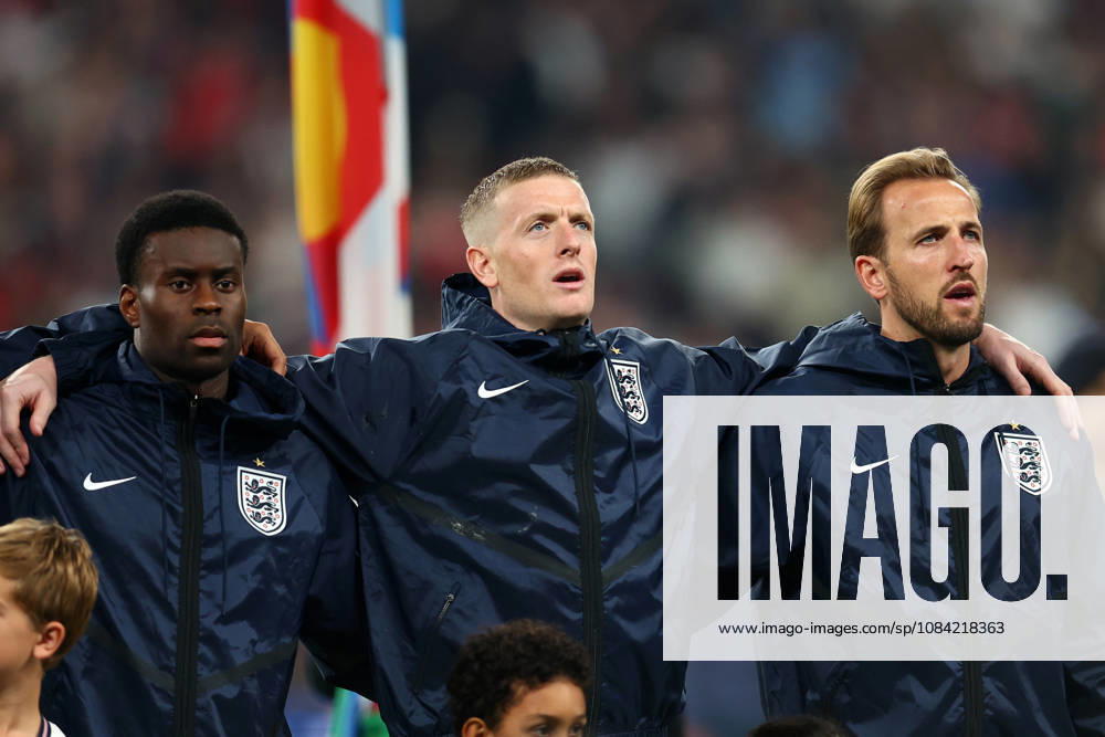 London, England, 6th October 2026. (L-R) Marc Guehi, Jordan Pickford and Harry Kane of England sing the national anthem during the England vs Czech Republic UEFA Nations League match at Wembley Stadium, London. Picture credit should read: Paul Terry Sportimage . SPI_054_PT_England__Czechia SPI-5055-0054