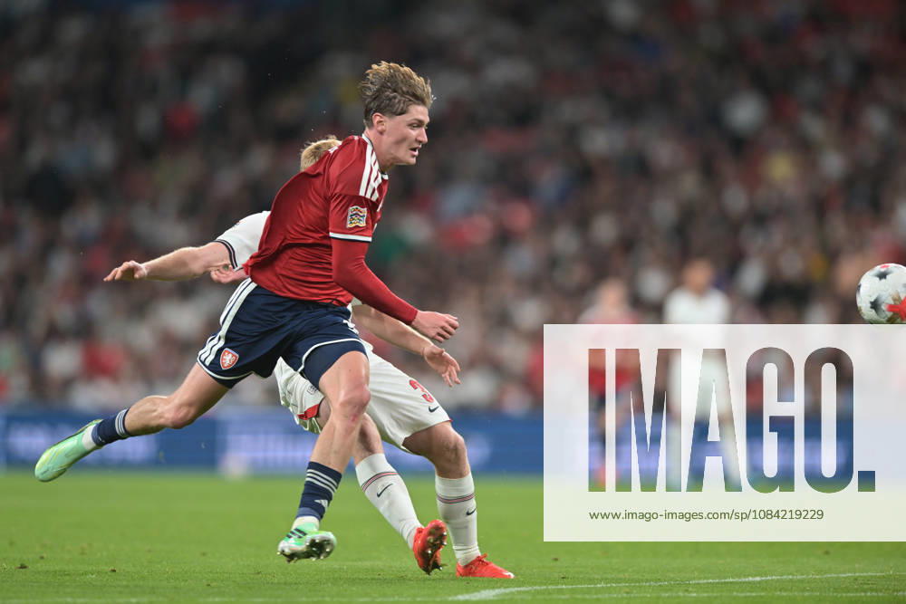 Lewis Hall of England and Ryan Naderi of Czechia chase the ball during the Nations League match between England and Czechia at Wembley Stadium, London, England on 6 October 2026.