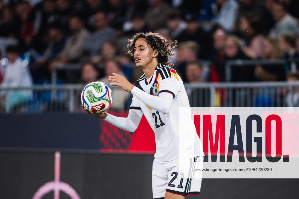 U-21 European Championship Qualifier: Germany vs. Georgia, October 6, 2026; Wael Mohya (Germany), age 21, taking a throw-in; stock soccer photo; U-21 European Championship Qualifier, Matchday 10: Germany vs. Georgia on October 6, 2026, Bielefeld DFB REGULATIONS PROHIBIT ANY USE OF PHOTOGRAPHS AS IMAGE SEQUENCES AND OR QUASI-VIDEO