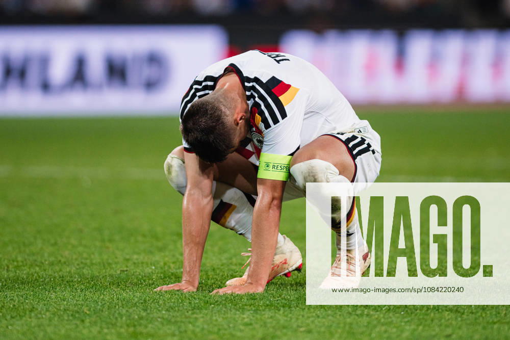 U-21 European Championship Qualifier: Germany vs. Georgia, October 6, 2026. Nicolò Tresoldi (Germany) lies on the ground after the final whistle. Soccer, U-21 European Championship Qualifier, Matchday 10: Germany vs. Georgia on October 6, 2026, Bielefeld DFB REGULATIONS PROHIBIT ANY USE OF PHOTOGRAPHS AS IMAGE SEQUENCES AND OR QUASI-VIDEO