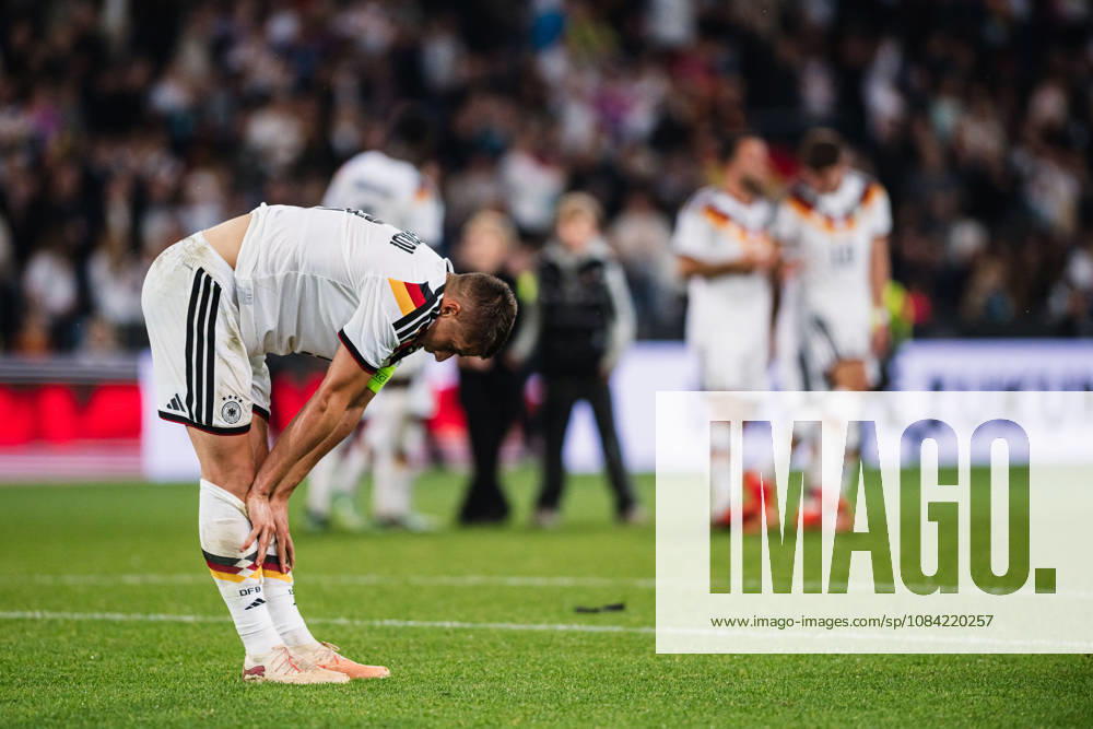 U-21 European Championship Qualifier: Germany vs. Georgia, October 6, 2026. Nicolò Tresoldi (Germany) lies on the ground after the final whistle. Soccer, U-21 European Championship Qualifier, Matchday 10: Germany vs. Georgia on October 6, 2026, Bielefeld DFB REGULATIONS PROHIBIT ANY USE OF PHOTOGRAPHS AS IMAGE SEQUENCES AND OR QUASI-VIDEO