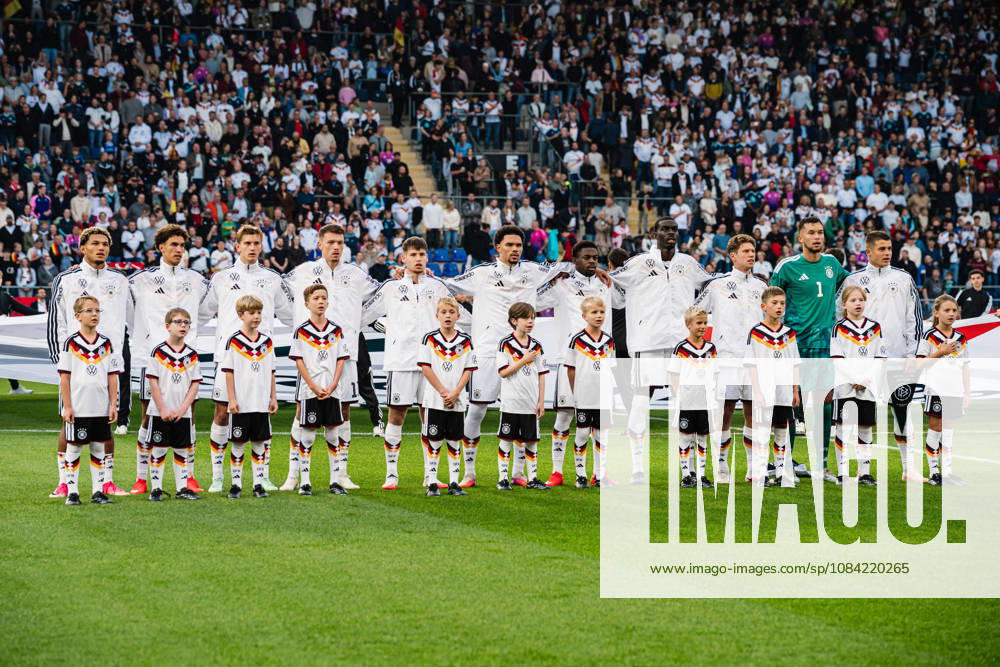 U21 European Championship Qualifier: Germany vs. Georgia, October 6, 2026; Germany during the national anthem: Paris Brunner (Germany), 19; Noah Darvich (Germany), 17; Aljoscha Kemlein (Germany), 16; Dženan Pejcinovic, Germany, 11, Nnamdi Collins, Germany, 20, Noel Aseko, Germany, 8, Joshua Quarshie, Germany, 5, Lukas Ullrich, Germany, 3, Elias Baum, Germany, 2, Mio Backhaus, Germany, 1, Nicolò Tresoldi Germany, 9 Soccer, U-21 European Championship Qualifiers, Matchday 10: Germany vs. Georgia on October 6, 2026, Bielefeld DFB REGULATIONS PROHIBIT ANY USE OF PHOTOGRAPHS AS IMAGE SEQUENCES AND OR QUASI-VIDEO