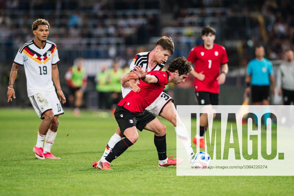 U-21 European Championship Qualifier: Germany vs. Georgia, October 6, 2026; Lukas Ullrich (Germany), 3, vs. Dato Bukia (Georgia), 3; Soccer; U-21 European Championship Qualifier; Matchday 10: Germany vs. Georgia on October 6, 2026; Bielefeld DFB REGULATIONS PROHIBIT ANY USE OF PHOTOGRAPHS AS IMAGE SEQUENCES AND OR QUASI-VIDEO