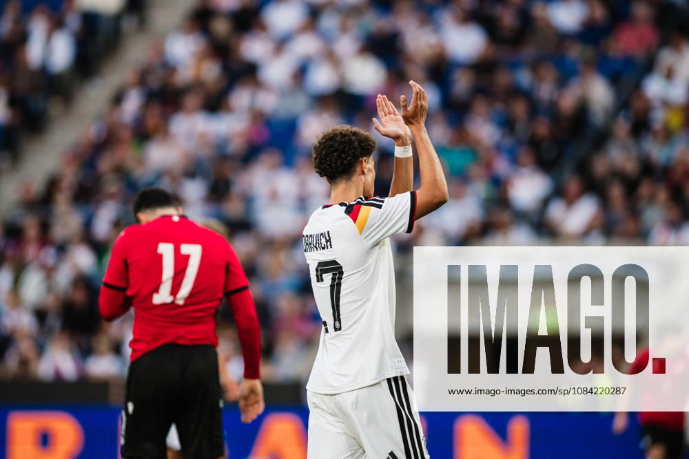 U-21 European Championship Qualifier: Germany vs. Georgia, October 6, 2026: Noah Darvich (Germany), 17, claps his hands; next to him, Akaki Giunashvili (Georgia), 17. Soccer, U-21 European Championship Qualifiers, Matchday 10: Germany vs. Georgia on October 6, 2026, Bielefeld DFB REGULATIONS PROHIBIT ANY USE OF PHOTOGRAPHS AS IMAGE SEQUENCES AND OR QUASI-VIDEO