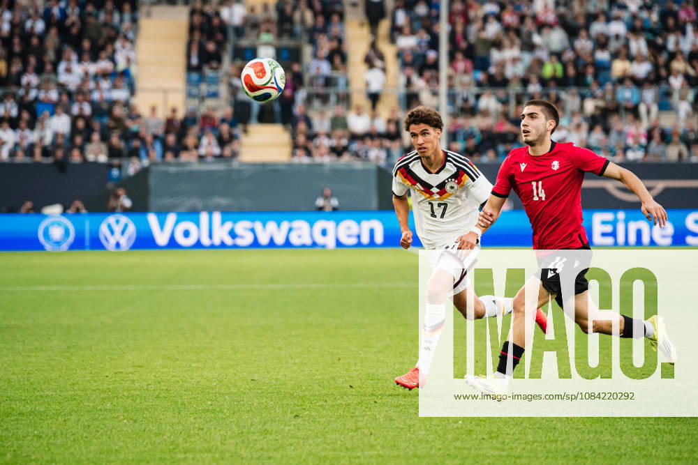 U-21 European Championship Qualifier: Germany vs. Georgia, October 6, 2026; Noah Darvich (Germany), 17; Aleko Basiladze (Georgia), 14; Soccer; U-21 European Championship Qualifier, Matchday 10: Germany vs. Georgia on October 6, 2026; Bielefeld DFB REGULATIONS PROHIBIT ANY USE OF PHOTOGRAPHS AS IMAGE SEQUENCES AND OR QUASI-VIDEO