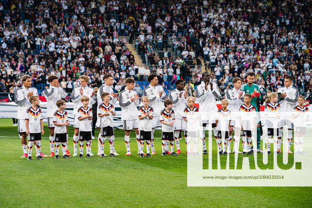 U21 European Championship Qualifier: Germany vs. Georgia, October 6, 2026; Germany during the national anthem: Paris Brunner (Germany), 19; Noah Darvich (Germany), 17; Aljoscha Kemlein (Germany), 16; Dženan Pejcinovic, Germany, 11, Nnamdi Collins, Germany, 20, Noel Aseko, Germany, 8, Joshua Quarshie, Germany, 5, Lukas Ullrich, Germany, 3, Elias Baum, Germany, 2, Mio Backhaus, Germany, 1, Nicolò Tresoldi Germany, 9 Soccer, U-21 European Championship Qualifiers, Matchday 10: Germany vs. Georgia on October 6, 2026, Bielefeld DFB REGULATIONS PROHIBIT ANY USE OF PHOTOGRAPHS AS IMAGE SEQUENCES AND OR QUASI-VIDEO