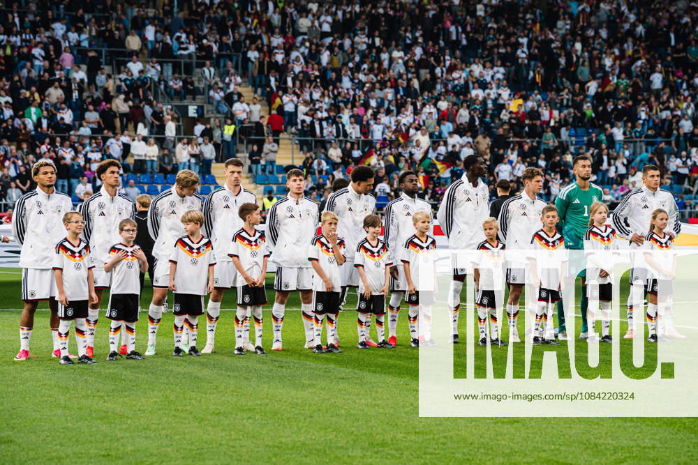 U21 European Championship Qualifier: Germany vs. Georgia, October 6, 2026; Germany during the national anthem: Paris Brunner (Germany), 19; Noah Darvich (Germany), 17; Aljoscha Kemlein (Germany), 16; Dženan Pejcinovic, Germany, 11, Nnamdi Collins, Germany, 20, Noel Aseko, Germany, 8, Joshua Quarshie, Germany, 5, Lukas Ullrich, Germany, 3, Elias Baum, Germany, 2, Mio Backhaus, Germany, 1, Nicolò Tresoldi Germany, 9 Soccer, U-21 European Championship Qualifiers, Matchday 10: Germany vs. Georgia on October 6, 2026, Bielefeld DFB REGULATIONS PROHIBIT ANY USE OF PHOTOGRAPHS AS IMAGE SEQUENCES AND OR QUASI-VIDEO