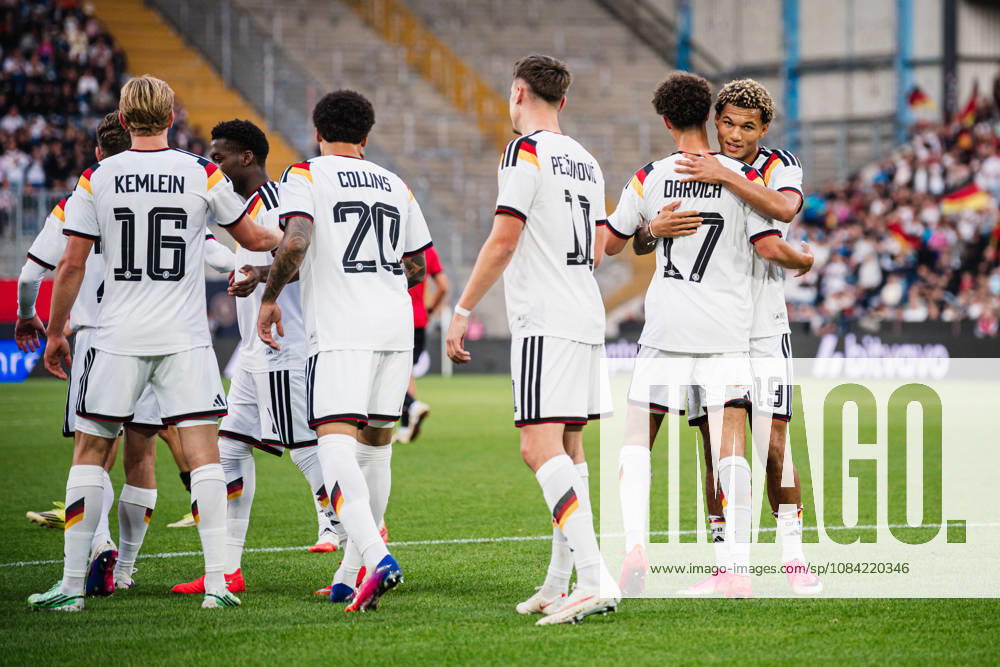 U-21 European Championship Qualifier: Germany vs. Georgia, October 6, 2026 GOAL, CELEBRATION after Noah Darvich (Germany, 17) scores the 1-0 goal, pictured here with Aljoscha Kemlein (Germany, 16) and Dženan Pejcinovic (Germany, 11), Nnamdi Collins (Germany, 20), and Paris Brunner (Germany, 19) hugging him. Soccer, U-21 European Championship Qualifiers, Matchday 10: Germany vs. Georgia on October 6, 2026, Bielefeld. DFB regulations prohibit any use of photographs as image sequences and or quasi-video.