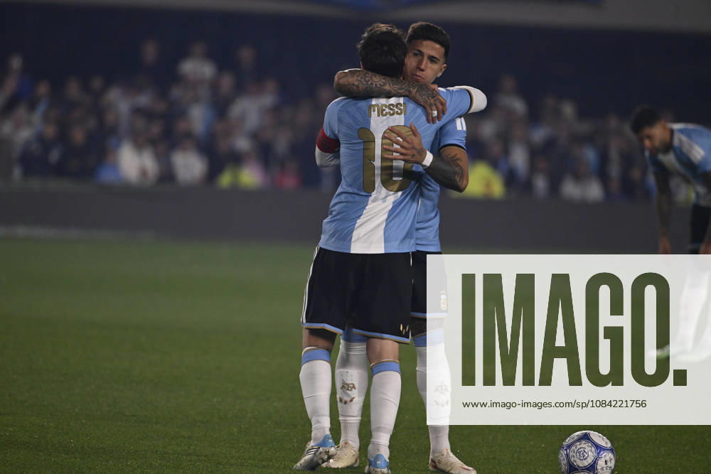 BUENOS AIRES, ARGENTINA - OCTOBER 06 : Forward Lionel Messi 10 of Argentina high-fives teammate Enzo Fernandez 8 during an International Friendly, Länderspiel, Nationalmannschaft match against Benin at Estadio Monumental on October 06, 2026 in Buenos Aires, Argentina. This historic match marks the final international appearance who wore a commemorative special-edition kit replacing the traditional manufacturer branding with his personal signature logo. Photo by SFSI Argentina national team, Nationalteam v Benin