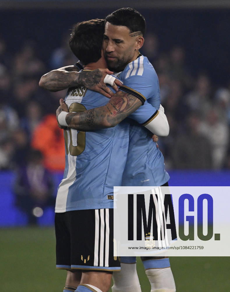 BUENOS AIRES, ARGENTINA - OCTOBER 06 : Forward Lionel Messi 10 of Argentina national team, Nationalteam high-fives teammate Nicolas Otamendi during an International Friendly, Länderspiel, Nationalmannschaft match against Benin at Estadio Monumental on October 06, 2026 in Buenos Aires, Argentina. This historic match marks the final international appearance who wore a commemorative special-edition kit replacing the traditional manufacturer branding with his personal signature logo. Photo by SFSI Argentina National team v Benin
