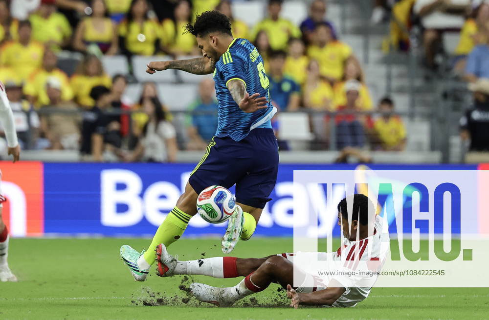 International soccer friendly - Colombia vs. Peru Colombia forward Luis Suarez (L) in action against Peru midfielder Wilder Cartagena (R) during the international soccer friendly between Colombia and Peru at Nu Stadium in Miami, Florida, USA, 06 October 2026. MIAMI FLORIDA United States