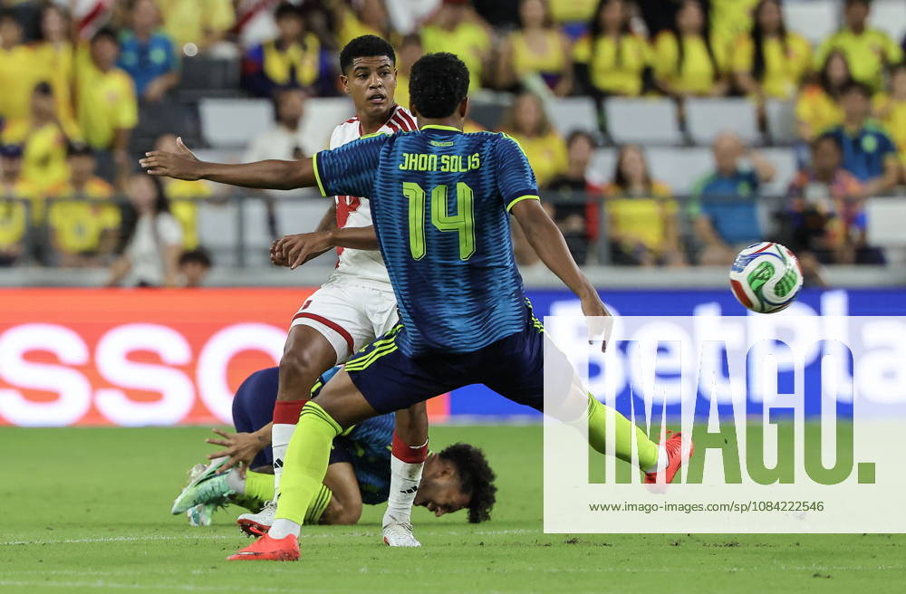 International soccer friendly - Colombia vs. Peru Peru midfielder Wilder Cartagena (L) in action against Colombia midfielder Jhon Solis (R) during the international soccer friendly between Colombia and Peru at Nu Stadium in Miami, Florida, USA, 06 October 2026. MIAMI FLORIDA United States