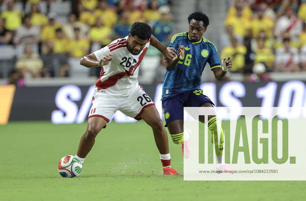 International soccer friendly - Colombia vs. Peru Peru midfielder Piero Magallanes (L) in action against Colombia forward Carlos Andres Gomez (R) during the international soccer friendly between Colombia and Peru at Nu Stadium in Miami, Florida, USA, 06 October 2026. MIAMI FLORIDA United States