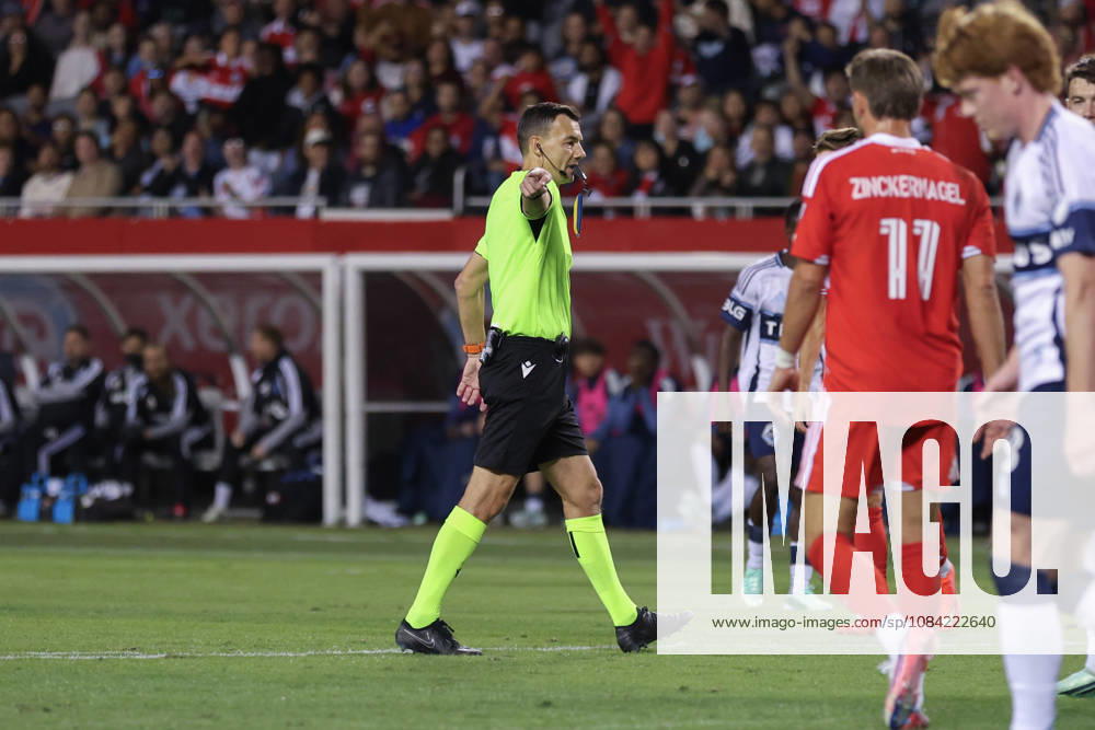 Referee points to the penalty spot during the Major League Soccer game between Chicago Fire FC and Vancouver Whitecaps FC at Soldier Field on Tuesday October 6 in Chicago, USA