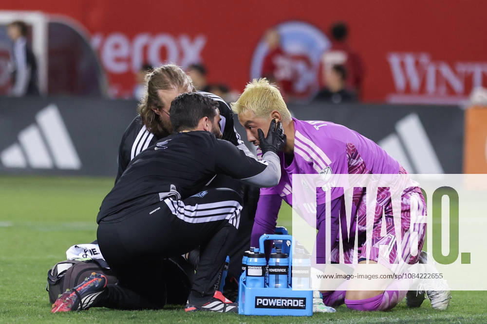 Yohei Takaoka (1 Vancouver Whitecaps FC) receives medical treatment during the Major League Soccer game between Chicago Fire FC and Vancouver Whitecaps FC at Soldier Field on Tuesday October 6 in Chicago, USA