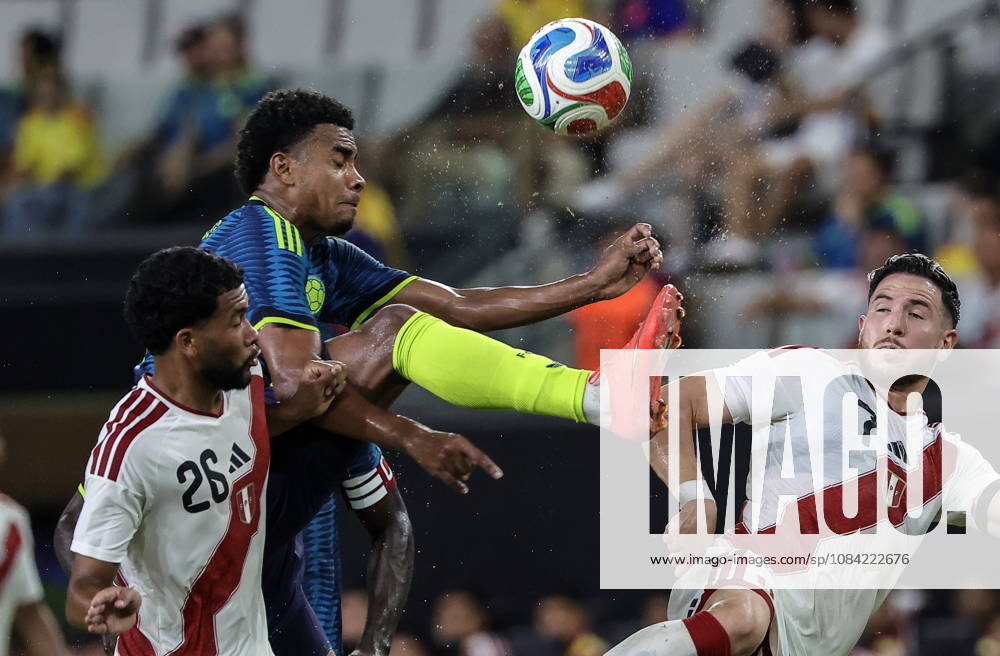 International soccer friendly - Colombia vs. Peru Colombia midfielder Jhon Solis (2-L) in action against Peru midfielder Piero Magallanes (L) and Peru forward Adrian Ugarriza (R) during the international soccer friendly between Colombia and Peru at Nu Stadium in Miami, Florida, USA, 06 October 2026. MIAMI FLORIDA United States