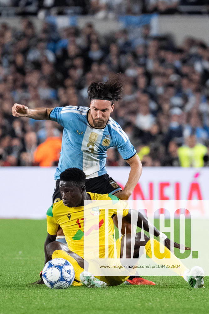 Nicolas Tagliafico of Argentina (R) and Rodolfo Aloko of Benin (L) fight for possession during the International Friendly, Länderspiel, Nationalmannschaft football match between Argentina and Benin at Estadio Monumental Antonio V. Liberti on October 06, 2026 in Buenos Aires, Argentina. (Photo by Richard Callis Sports Press Photo)