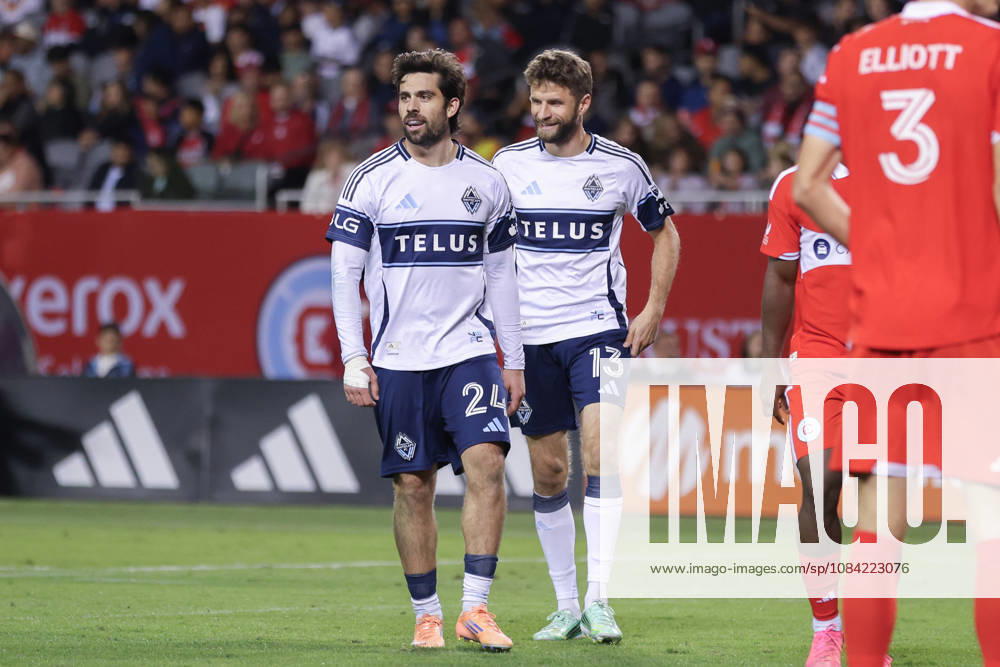 Brian White (24 Vancouver Whitecaps FC) and Thomas Müller (13 Vancouver Whitecaps FC) are seen during the Major League Soccer game between Chicago Fire FC and Vancouver Whitecaps FC at Soldier Field on Tuesday October 6 in Chicago, USA