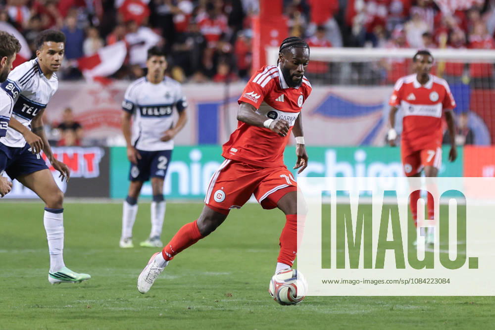 Jonathan Bamba (19 Chicago Fire FC) dribbles the ball during the Major League Soccer game between Chicago Fire FC and Vancouver Whitecaps FC at Soldier Field on Tuesday October 6 in Chicago, USA